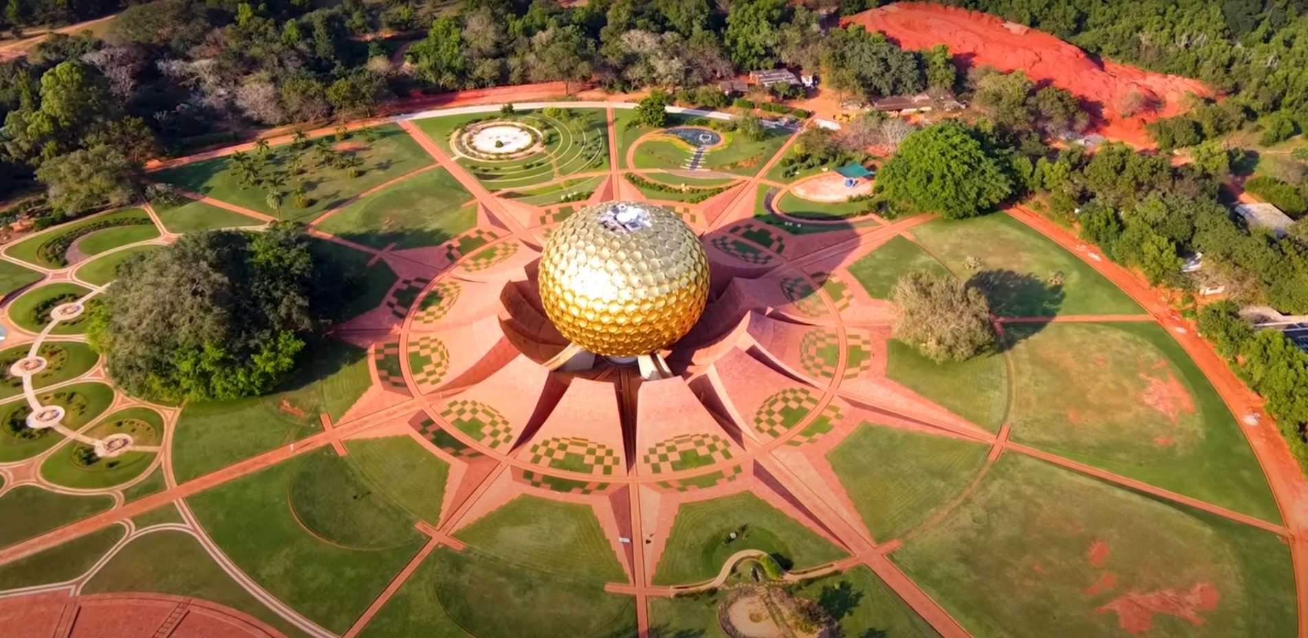 Aerial drone view of Matrimandir and the spiraling design of Auroville township