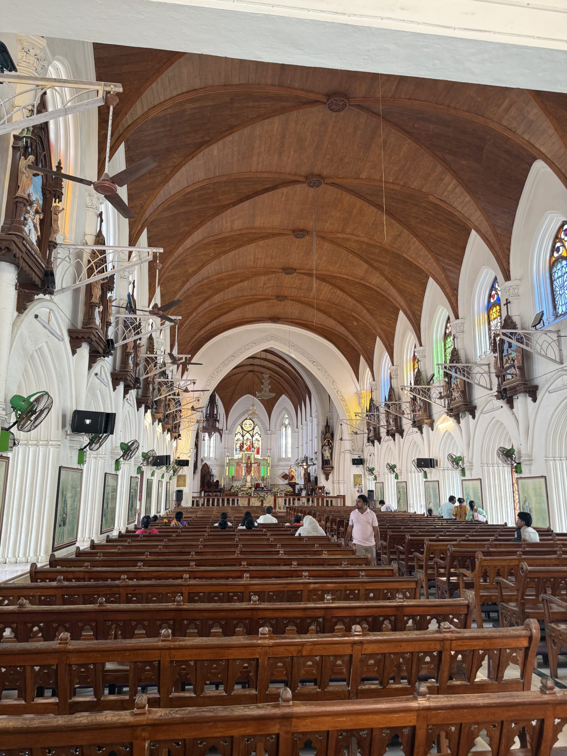 Interior of Santhome Cathedral Basilica with stained-glass windows